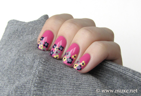 Pink nail art with flowers