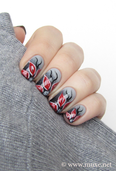 Flowers on grey nail design