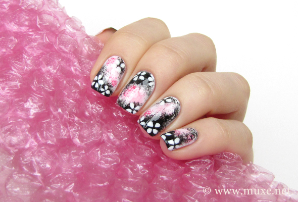 Sakura nail design in pink and black Sakura nail design in pink and black