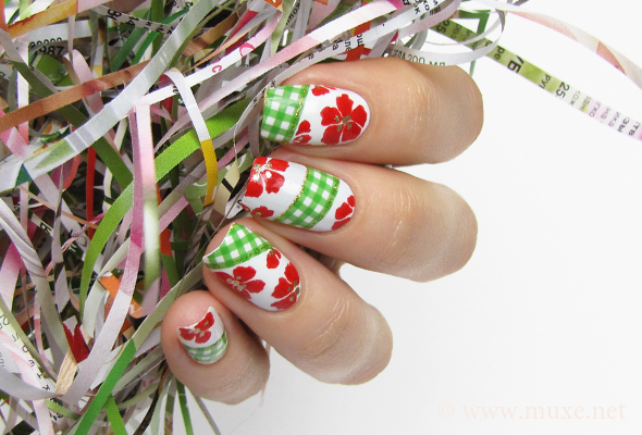 White nails with red flowers design