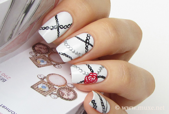 Goth nail art with silver studs Goth nail art with silver studs