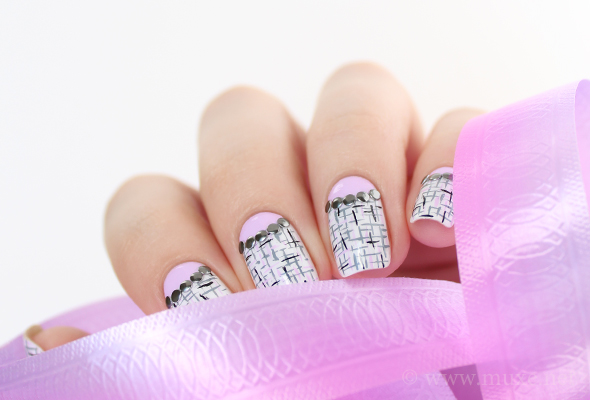 Metal studs in half moon nail art Metal studs in half moon nail art